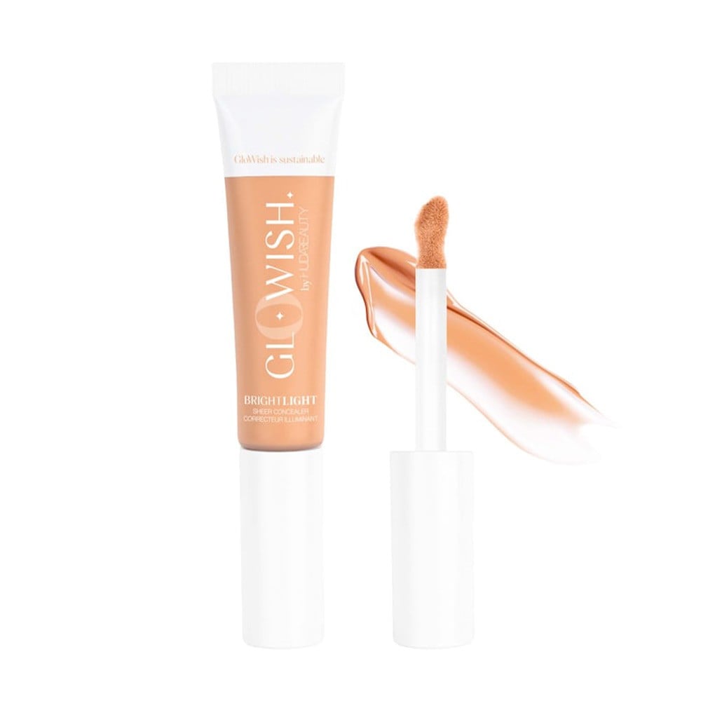 Huda Beauty GloWish Bright Light Hydrating Sheer Vegan Concealer in the shade 04 Light Medium.