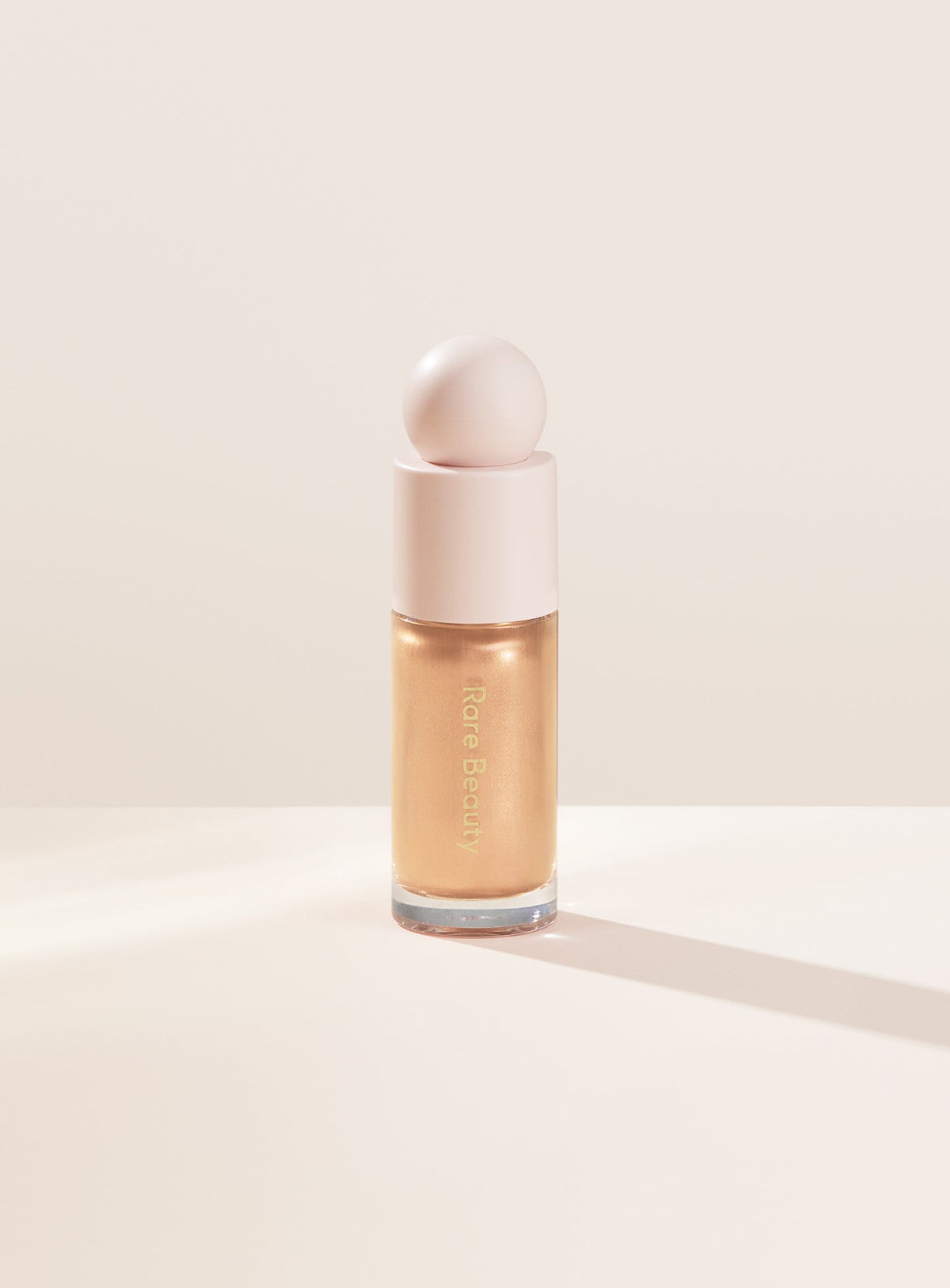 Rare Beauty Positive Light Liquid Luminizer (Outshine)